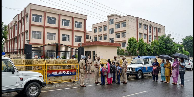 Police conduct security checks after schools and colleges in Patiala received bomb threat emails warning of a possible blast.