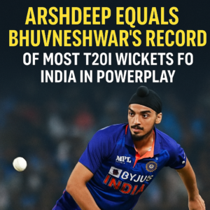Arshdeep Singh bowling in a T20 match with text highlighting that he equalled Bhuvneshwar Kumar’s record for most powerplay wickets for India.